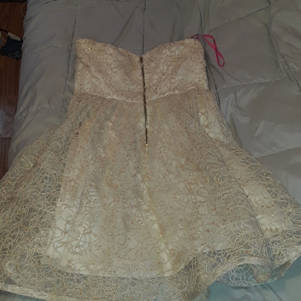 Strapless gold sequin dress